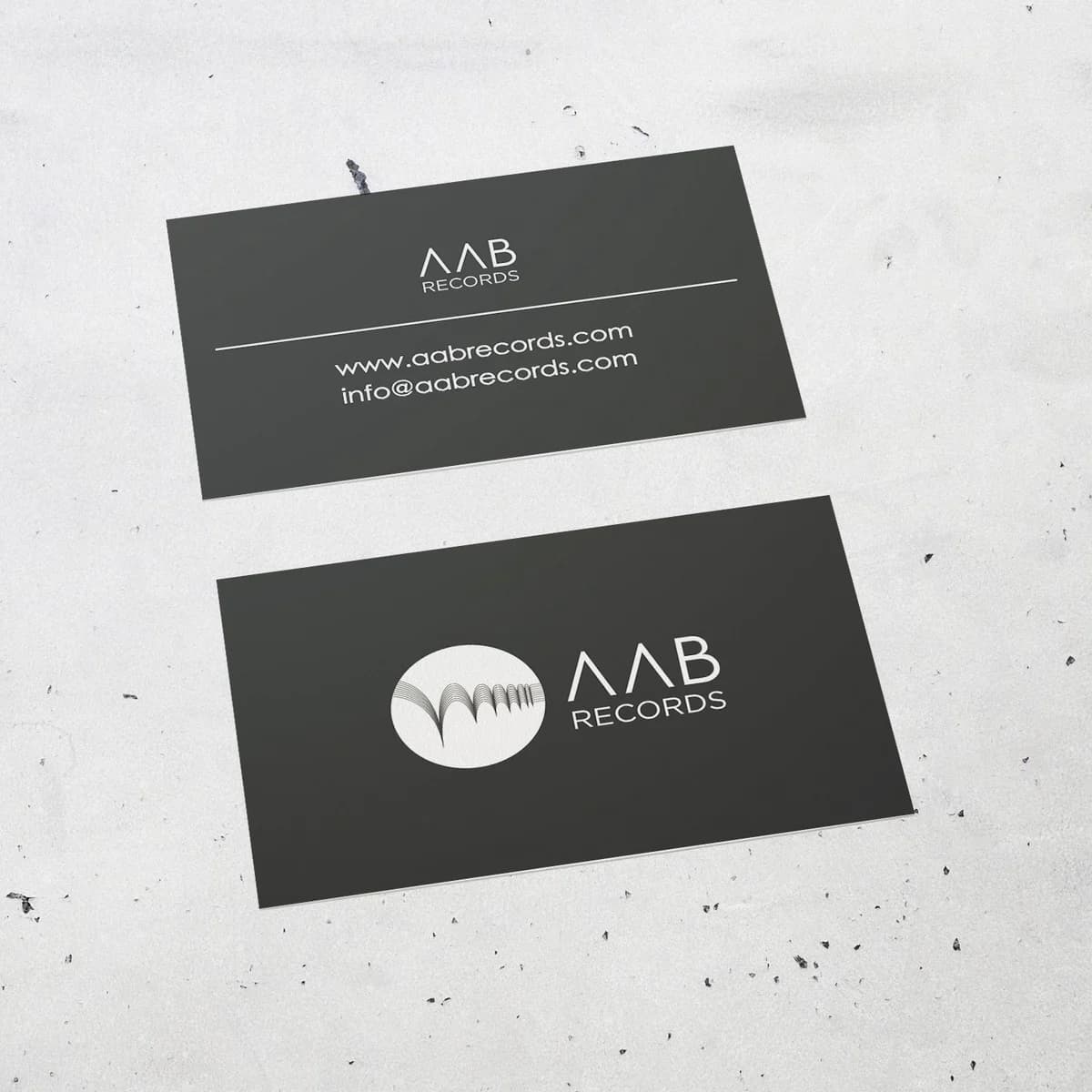 Archived AAB Records business-card mockup, with a horizontal mark and wordmark on one side and contact details on the other